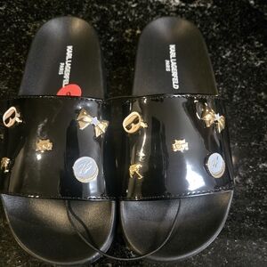 Karl Lagerfeld Black Patent Slide Sandals with Gold Logo Charms